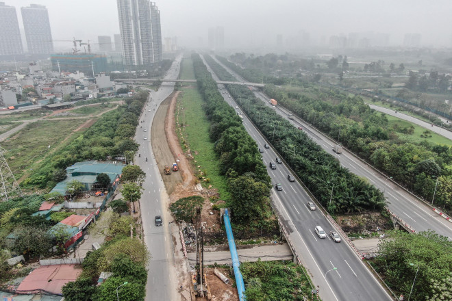 See the construction site to widen the collection road, overcome the situation " it floods every time it rains"  at Thang Long Boulevard - 11