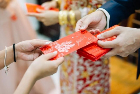 Cha mẹ nhất định phải dạy con những điều này khi nhận lì xì Tết