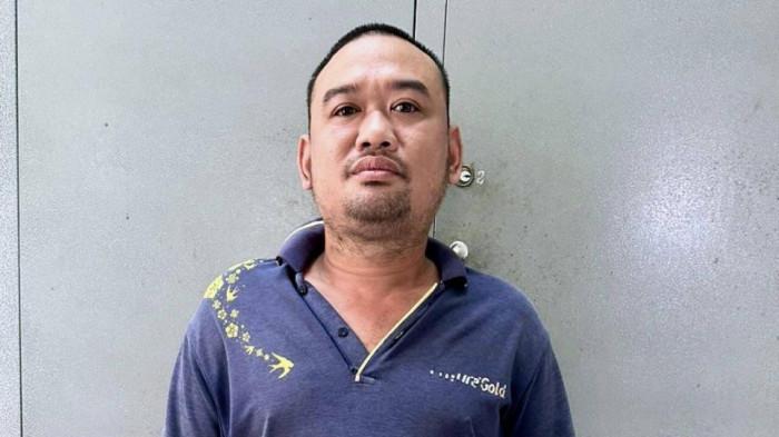 Phạm Hoàng Lợi tại cơ quan công an. Ảnh: Trọng Nguyễn