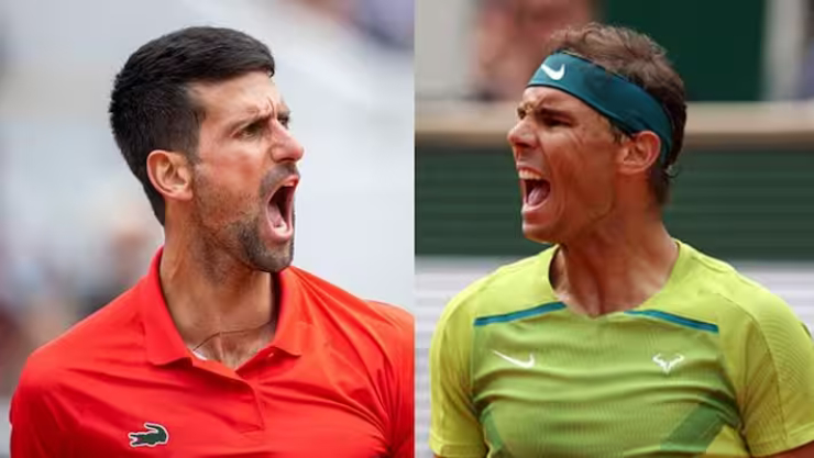 Nadal (phải) gửi lời chúc mừng tới Djokovic (trái) sau khi tay vợt Serbia chạm 22 danh hiệu lớn