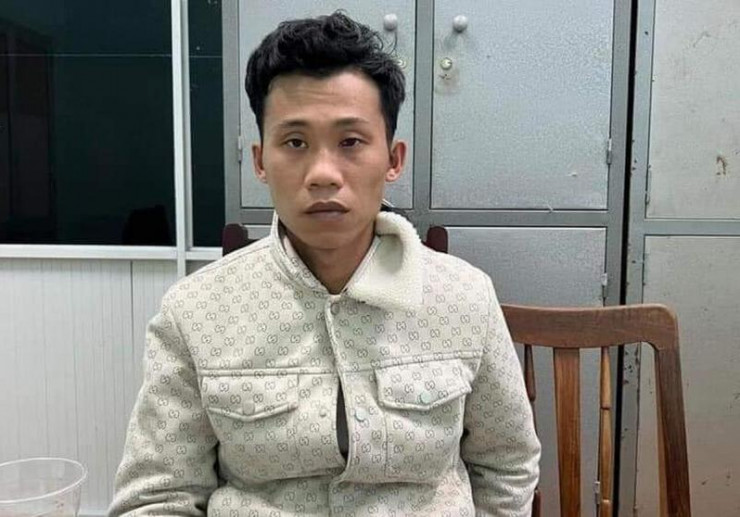 Nguyễn Trần Minh Thiên sau khi bị bắt giữ.