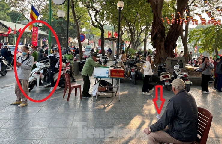 Bãi xe tại chùa Trấn Quốc lấn chiếm diện tích, thu giá chặt chém và sử dụng vé tự in sai quy định (mũi tên)... Tại một số thời điểm, có công an đứng làm nhiệm vụ (vòng tròn) ở đây.