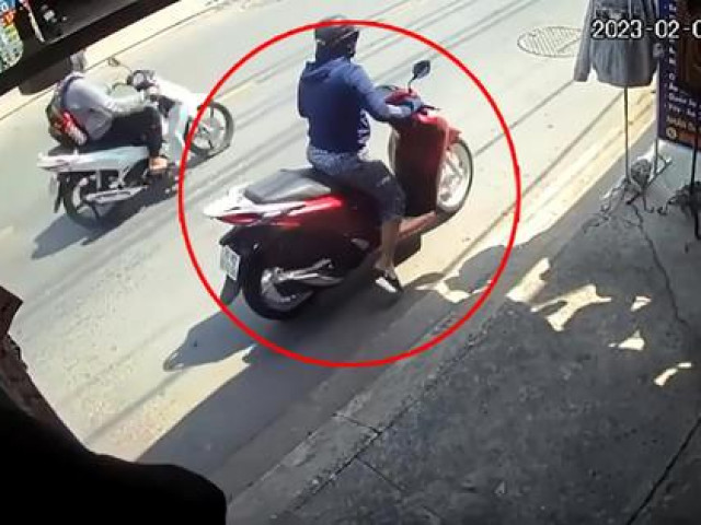 Pháp luật - Người phụ nữ đi xe SH lấy trộm áo ở cửa hàng thời trang