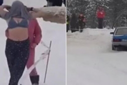 Thể thao - Nữ cổ động viên vạch áo khoe "vòng 1" khiến tay đua "hoa mắt" bị tai nạn