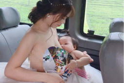 Bạn trẻ - Cuộc sống - Cô dâu vén váy cho con bú ngay trên xe hoa và cuộc hôn nhân như mơ