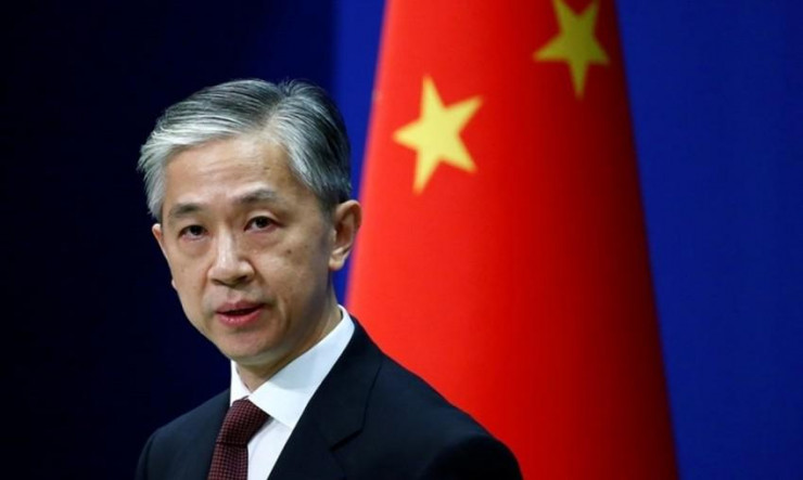 Phát ngôn viên Bộ Ngoại giao Trung Quốc - ông Uông Văn Bân. Ảnh: REUTERS