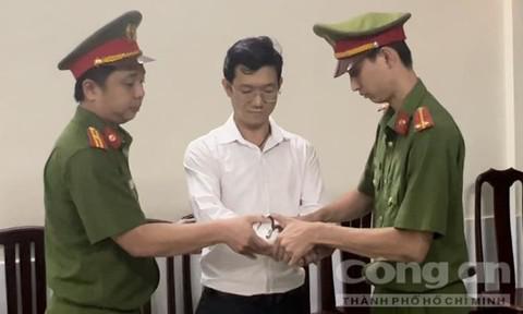 Tin chính thức từ Công an TPHCM: Bắt tạm giam nhà báo Hàn Ni, TS Đặng Anh Quân - 1