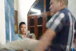 Trưởng văn phòng công chứng bị "tung cước" vào mặt cầu cứu Thiếu tướng Đinh Văn Nơi