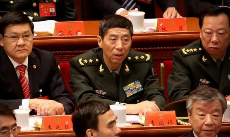Ông Lý Thượng Phúc (trung tâm ảnh) trong một cuộc họp tại Đại lễ đường Nhân dân ở Bắc Kinh, Trung Quốc. Ảnh: AP