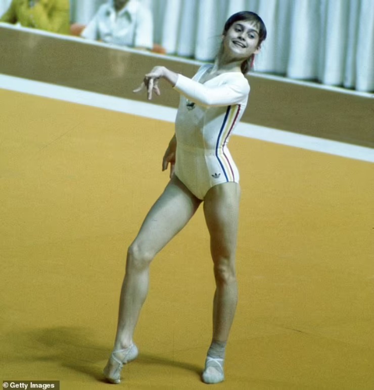 Nadia Comaneci vô địch thể dục dụng cụ khi 14 tuổi, 8 tháng
