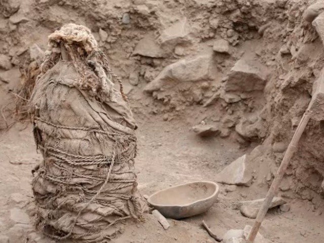 Khai quật 4 xác ướp trẻ em có niên đại 1.000 năm tuổi, còn nguyên tóc trên hộp sọ
