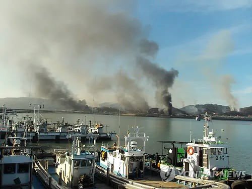 Vụ Triều Tiên nã pháo vào đảo Yonphyong (Hàn Quốc) hồi năm 2010. Ảnh: YONHAP