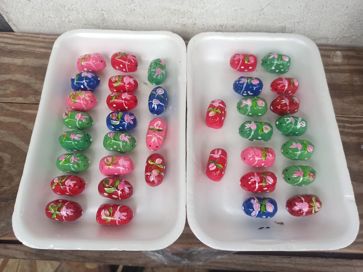 Những chú lợn đất mini làm móc khóa lưu niệm