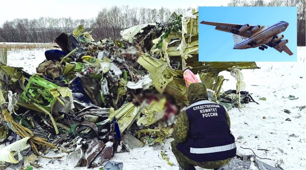 Chuyên viên điều tra của Nga tại hiện trường vụ rơi máy bay Il-76. Ảnh: TASS