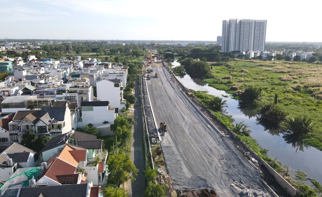 Dự án xây dựng, mở rộng quốc lộ 50 qua huyện Bình Chánh giúp kết nối TP HCM với Long An, Tiền Giang tốt hơn.