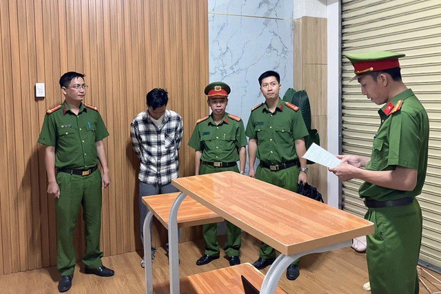 Công an thi hành lệnh bắt bị can Trần Quốc Huy