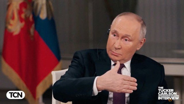 Tổng thống Vladimir Putin trong cuộc phỏng vấn được phát sóng hôm 8-2. Ảnh: Reuters
