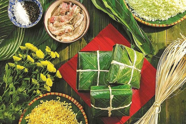 Bánh chưng xanh là món ăn quen thuộc trong ngày Tết của người Việt Nam (Ảnh: TL)