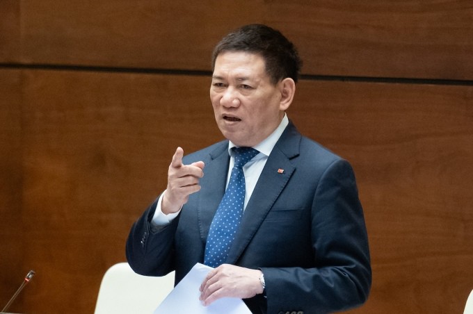 Bộ trưởng Tài chính Hồ Đức Phớc trả lời tại phiên chất vấn, trả lời chất vấn, sáng 18/3. Ảnh: Trung tâm báo chí Quốc hội