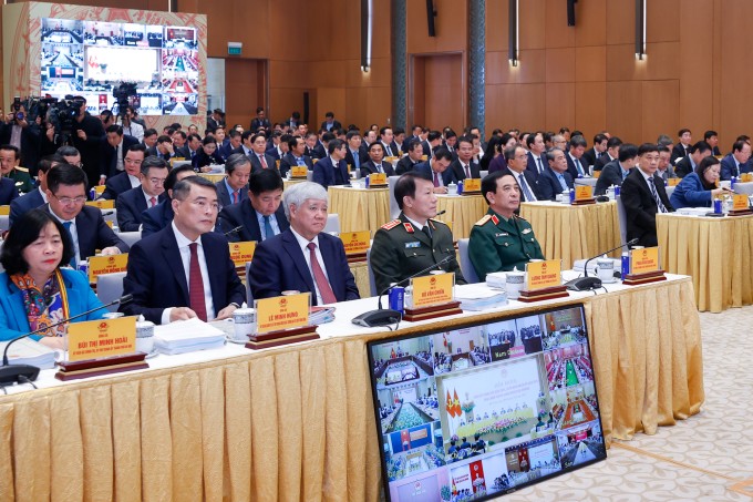 Đại biểu dự hội nghị Chính phủ và địa phương, sáng 8/1. Ảnh: Nhật Bắc