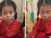 Bạn trẻ - Cuộc sống - Clip bé gái với gương mặt 'gượng ép' đưa tiền lì xì cho mẹ khiến ai cũng bật cười