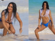 Thời trang - Kim Kardashian lăn lộn chụp hình trên bãi biển