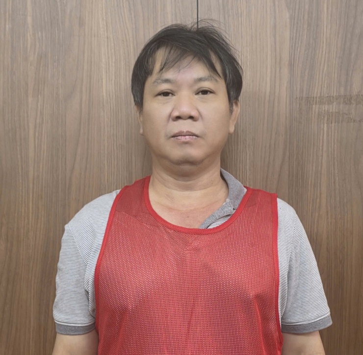 Nguyễn Hữu Tiến tại cơ quan công an.