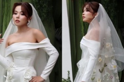 Váy cưới thêu hoa cúc của ca sĩ 'Bốn chữ lắm'