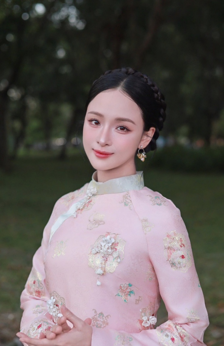 Gu diện áo dài của Hoa hậu Trương Hồ Phương Nga - 7