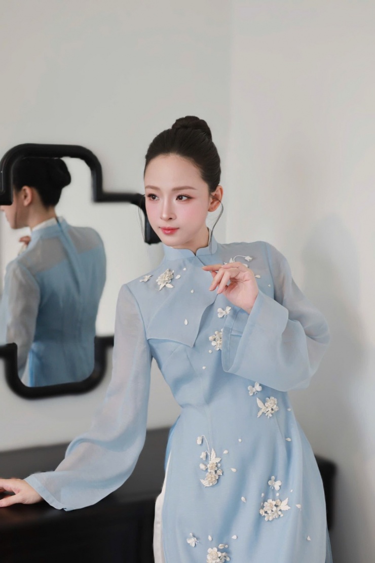 Gu diện áo dài của Hoa hậu Trương Hồ Phương Nga - 9