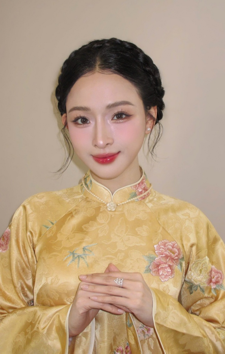 Gu diện áo dài của Hoa hậu Trương Hồ Phương Nga - 10