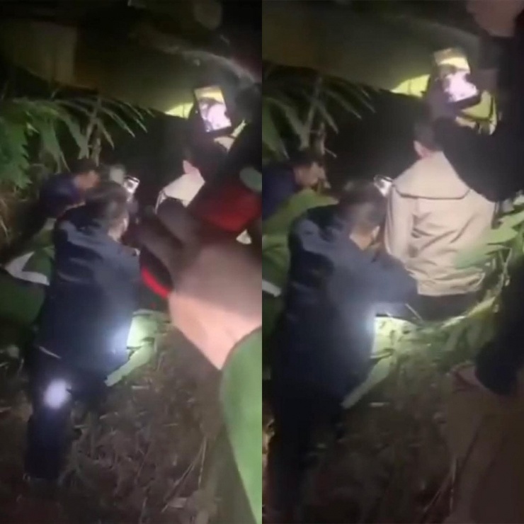 Lực lượng chức năng tìm kiếm nạn nhân. Ảnh cắt từ video.