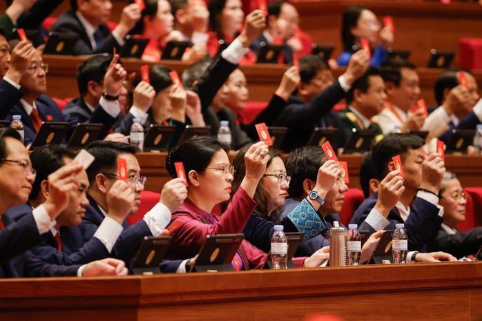 Các đại biểu biểu quyết thông qua Quy chế làm việc của Đại hội Đại biểu toàn quốc lần thứ XIV của Đảng. Ảnh: TTXVN