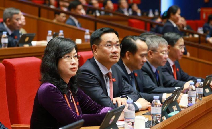 Bộ trưởng Bộ Y tế Đào Hồng Lan, Bí thư Thành ủy Đà Nẵng Lê Ngọc Quang và các đại biểu tại Đại hội XIV của Đảng. Ảnh: TTXVN