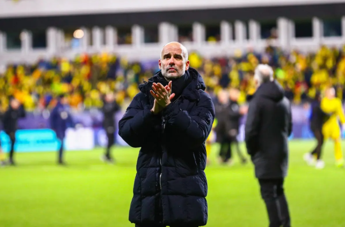 HLV Pep Guardiola phản ứng sau trận. Ảnh: EPA