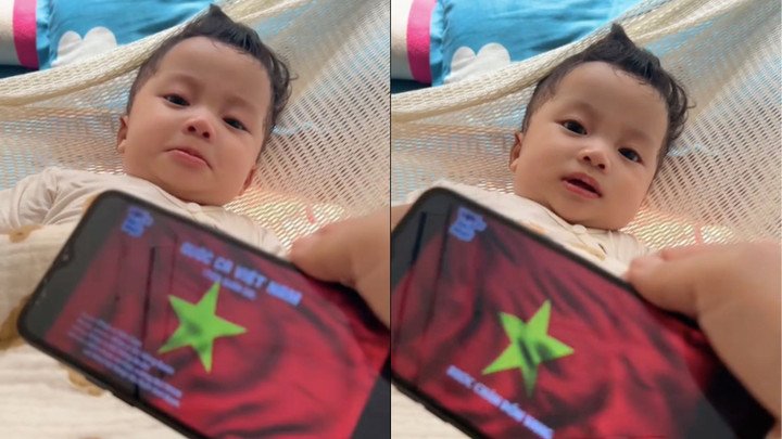 Nhiều dân mạng nhận định em bé đúng là yêu nước từ trong nôi. (Ảnh chụp màn hình)
