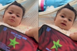 Tuyệt chiêu dỗ con của ông bố trẻ: Bé nín khóc ngay khi nghe Quốc ca