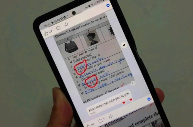 Bài kiểm tra của học sinh bị thêm nét chữ theo phản ánh của phụ huynh (Ảnh chụp màn hình).