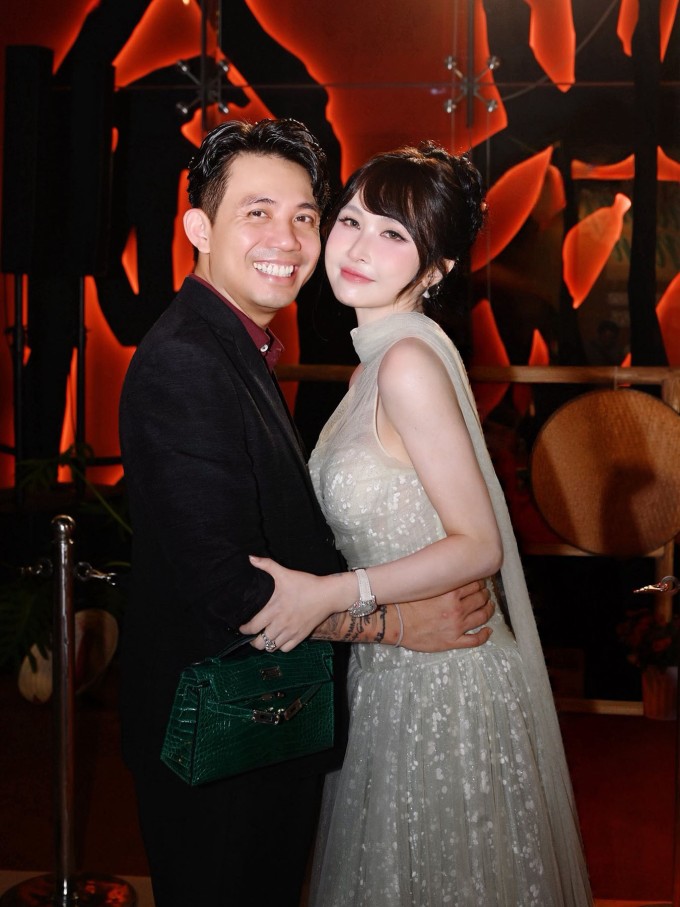 Vợ chồng Minh "Nhựa" - Mina Phạm dự một sự kiện gần đây.