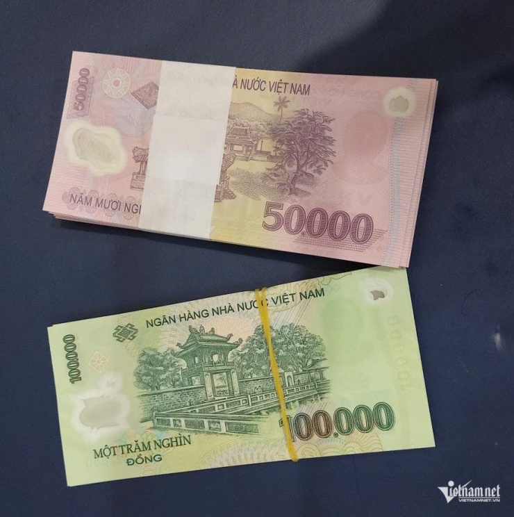 Pháp luật không cho phép cá nhân hoặc tổ chức tự phát đổi tiền mới, tiền lẻ để thu phí chênh lệch. Ảnh: N.T.