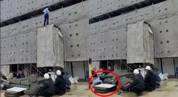 Tô Đức Dương ngã chệch khỏi các tấm nệm bảo hộ. Ảnh: Next Apple