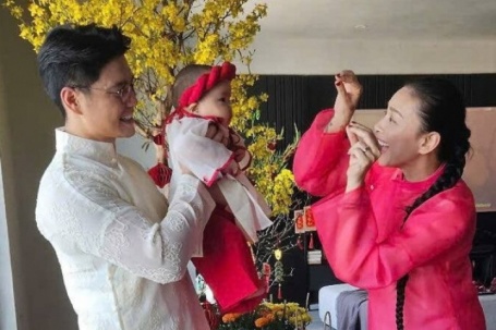 Ảnh sao 18/2: Con gái Ngô Thanh Vân - Huy Trần lần đầu mặc áo dài