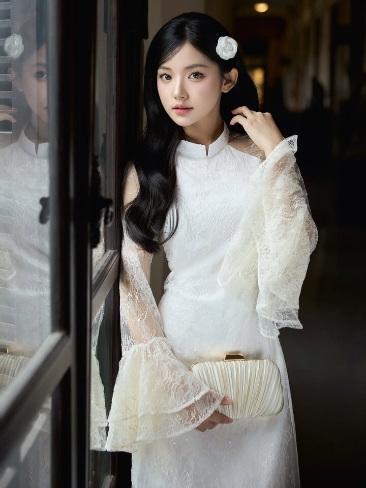 Quỳnh Trương trong tà áo dài trắng tinh khôi, kết hợp cùng khăn voan.