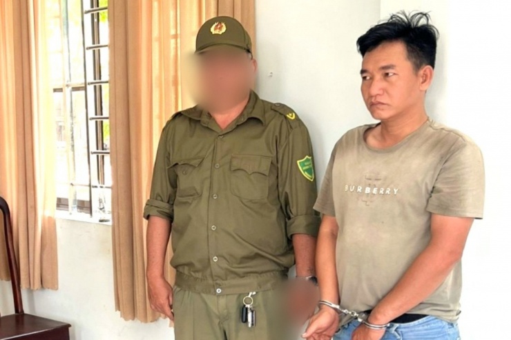 Nguyễn Mạnh Cường tại cơ quan công an. Ảnh: N.H