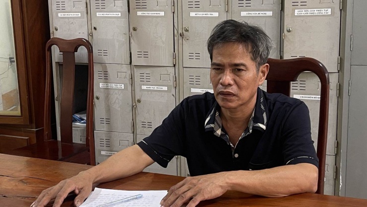 Đối tượng Lê Văn Thương tại cơ quan điều tra. Ảnh: CACC