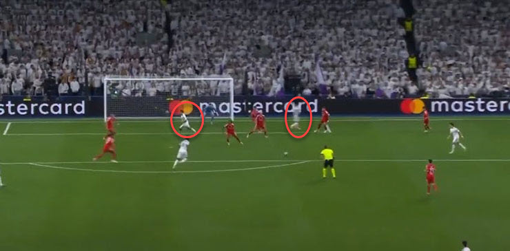 Vinicius (trái) và Garcia (phải) hút người cho Tchouameni ghi bàn trước Benfica