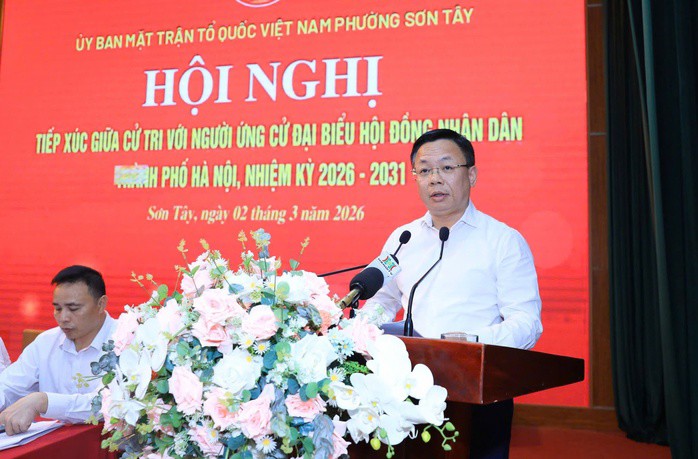 Ông Trần Thanh Hà, Chánh Văn phòng Đoàn đại biểu Quốc hội và HĐND TP Hà Nội báo cáo chương trình hành động