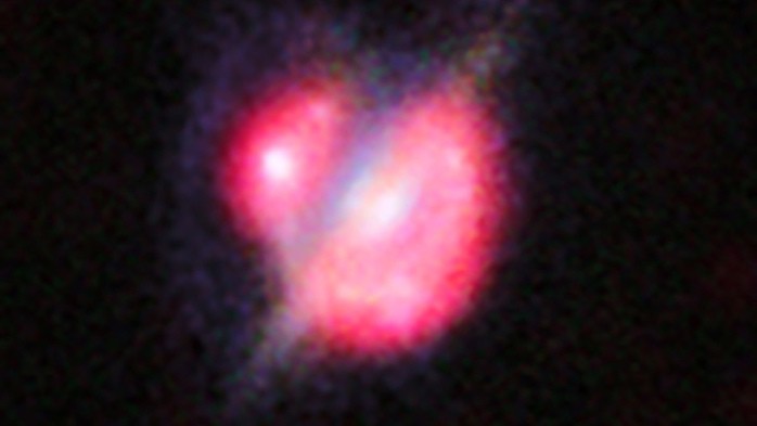 Hình ảnh được đồ họa từ dữ liệu tổng hợp của các đài thiên văn mặt đất và không gian cho thấy 2 thiên hà hợp nhất HATLAS J142935.3–002836, "thủ phạm" phát "tia laser vũ trụ" chạm đến tận Trái Đất - Ảnh:ESO/NAOJ/NRAO/NASA/ESA