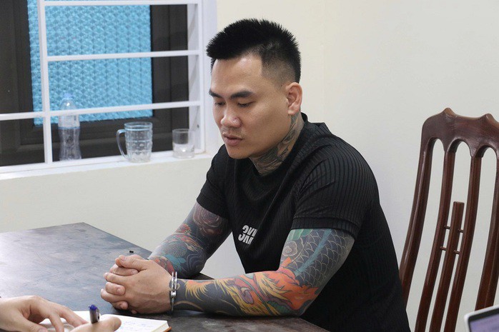 Trần Hữu Giáp tại cơ quan công an. Ảnh: V. Hậu