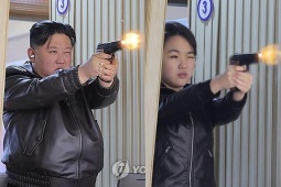 Thị sát nhà máy vũ khí, nhà lãnh đạo Triều Tiên cùng con gái thử nghiệm bắn súng